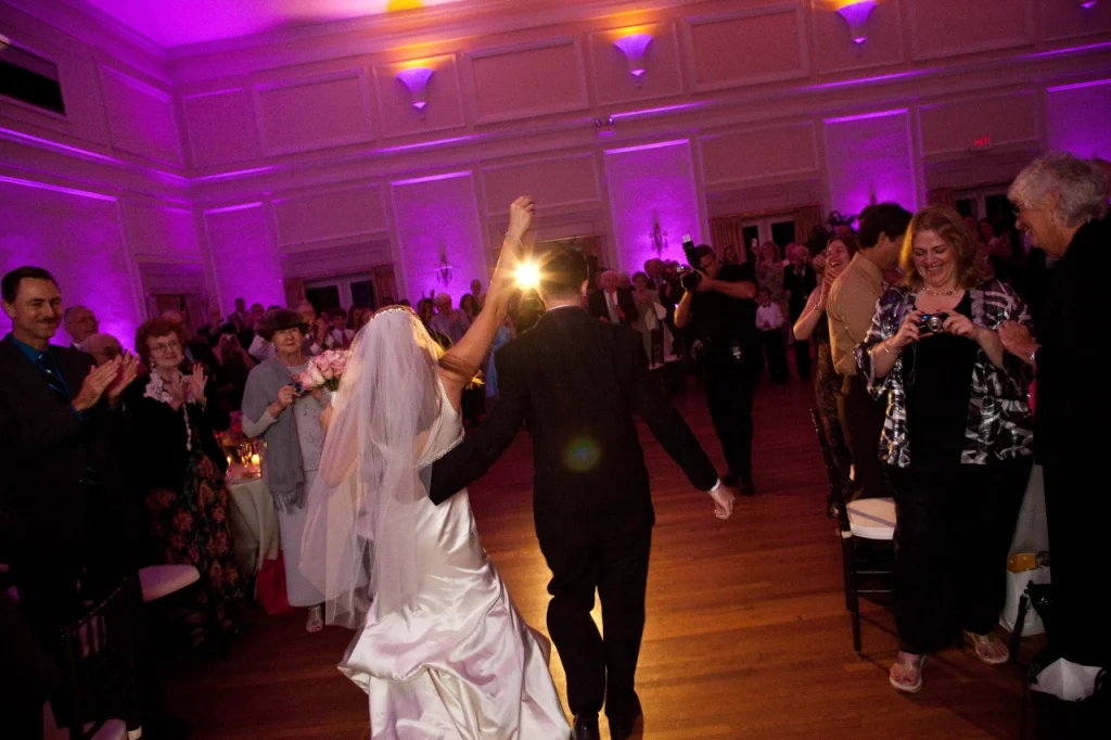 Image of bride and groom celebrating at reception